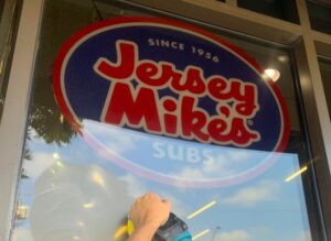 Fixing the window pane at Jersey Mike;s